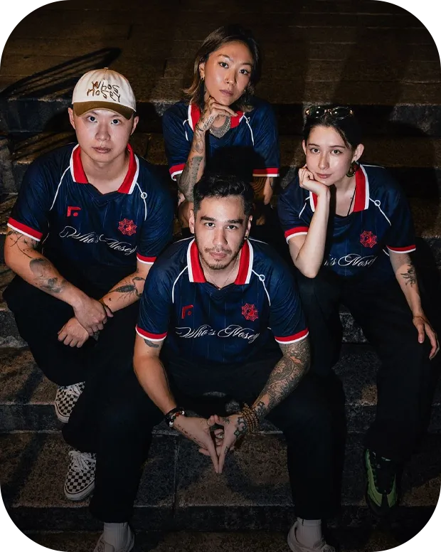 Team members wearing navy custom esports jerseys for gaming events