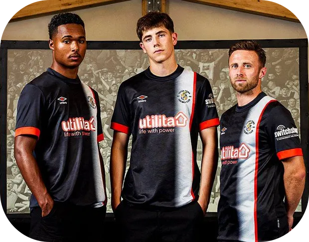 Professional esports players wearing black customized team jerseys