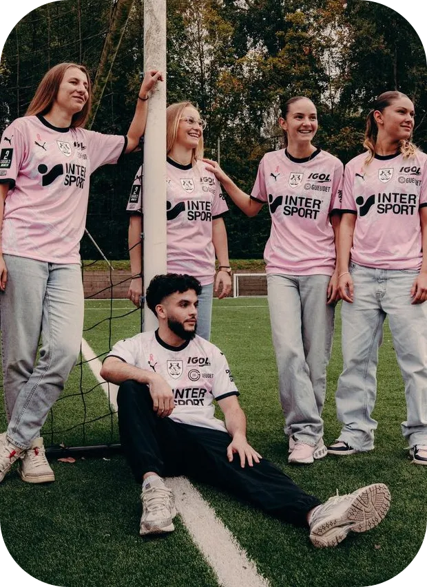 Esports players wearing pink custom jerseys during a team gathering